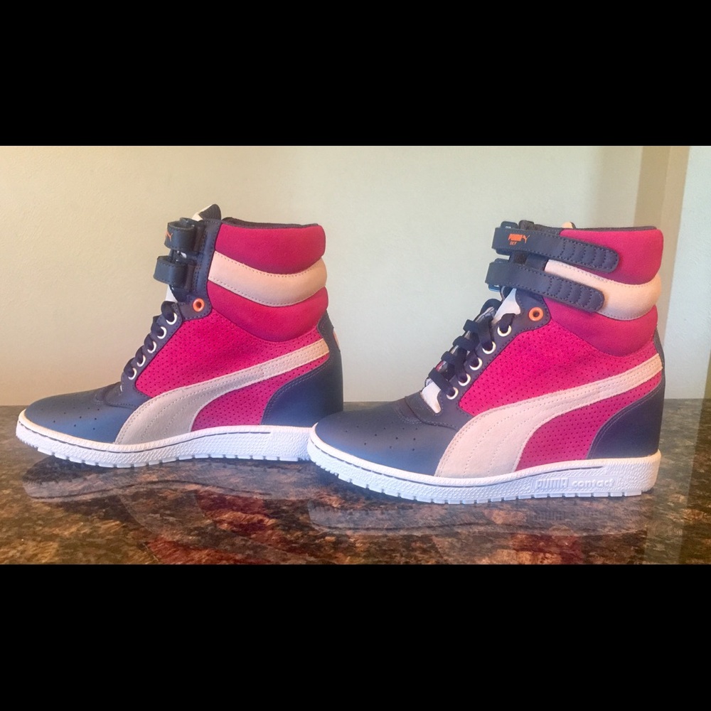 PUMA Women's Sky Wedge Sneaker.
Leather & Suede,